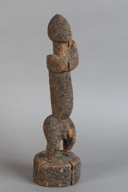 A strongly sexualized fetish, depicted standing...