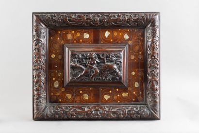 Carved walnut panel depicting a woman riding...