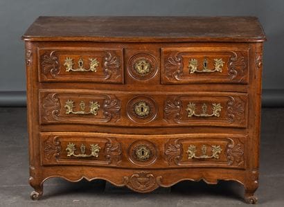 Chest of drawers with a curved front made...