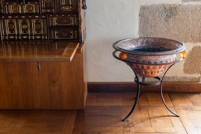 Copper repoussé cooling basin with gadroons...