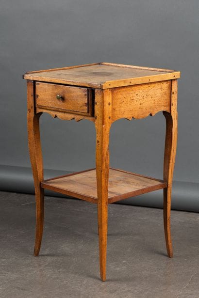 Small walnut side table with a drawer set...