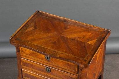 Rosewood veneer chest of drawers, with green-stained...