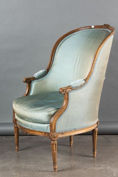 Gondola-style armchair in molded and carved...