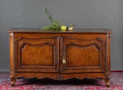 Large oak sideboard with molded and carved...