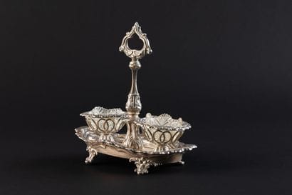 DOUBLE SALT SHAKER in silver (950). 
PARIS,...