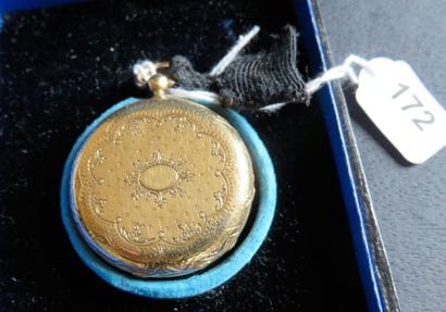 Montre pendentif en or jaune 750 millièmes,...