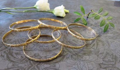 Bracelet semainier or jaune 750 millièmes,...