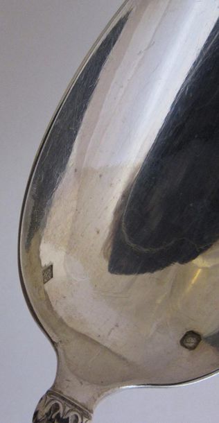 Série de douze cuillers à entremets en argent,...