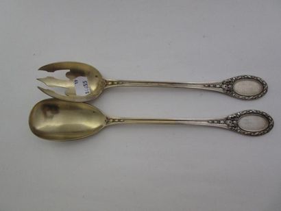 Couvert à salade en argent et argent doré....