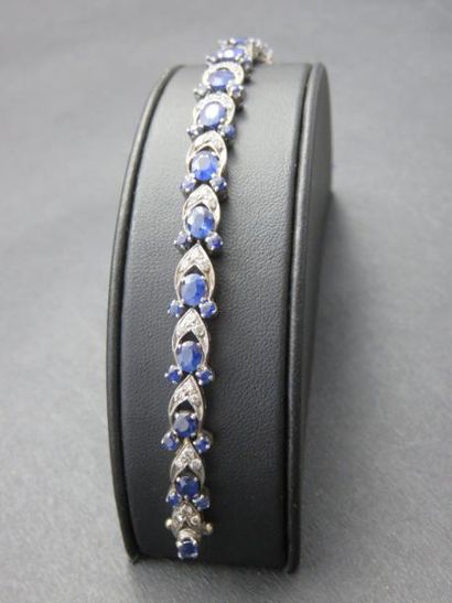 Bracelet rivière, or gris 750 millièmes orné...