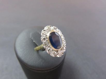 Bague or jaune et gris 750 millièmes, forme...