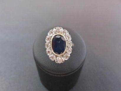 Bague or jaune et gris 750 millièmes, forme...