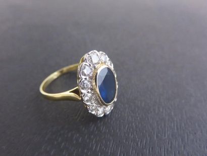 Bague or jaune et gris 750 millièmes, forme...
