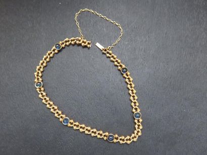 Bracelet or jaune 750 millièmes serti clos...