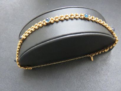 Bracelet or jaune 750 millièmes serti clos...