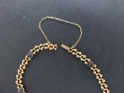 Bracelet or jaune 750 millièmes serti clos...