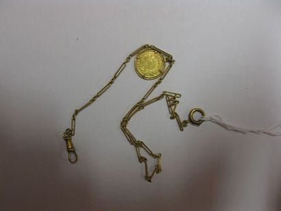 Chaîne de montre en or jaune 750 millièmes,...