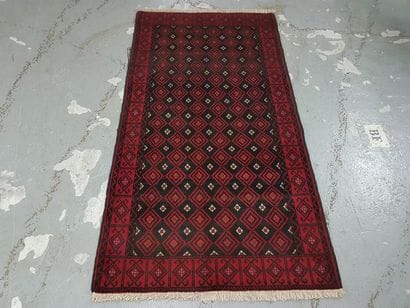 Tapis d'Iran BELOUTCH en laine points noués...