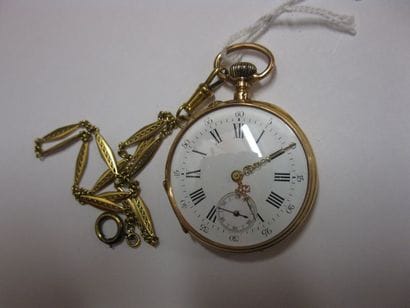 Montre de poche en or rose et sa chaîne en...