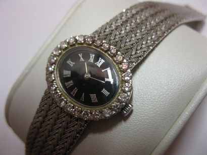 Montre tour de bras de dame, or gris 750...
