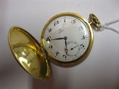 OMEGA
Montre de poche savonnette en or jaune...