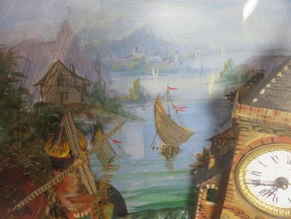 Pendule automate sous globe. A droite, un...