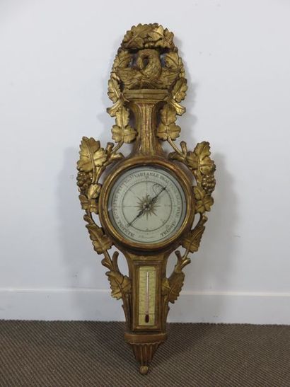 Baromètre-thermomètre en bois sculpté et...