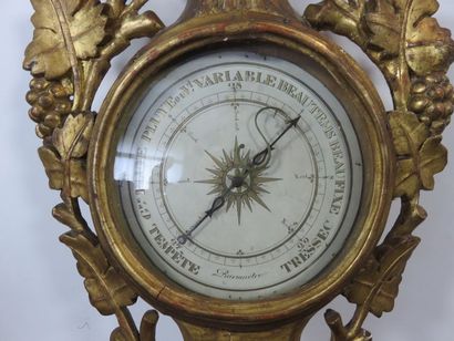 Baromètre-thermomètre en bois sculpté et...