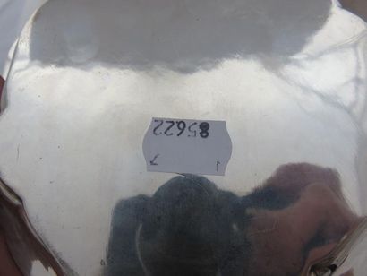 Série de six dessous de carafes en argent....