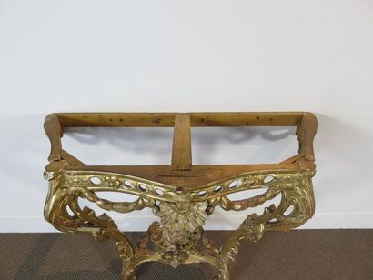 Console en bois sculpté et doré. Ceinture...