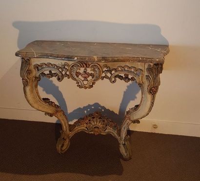 Console en bois laqué polychrome à riche...