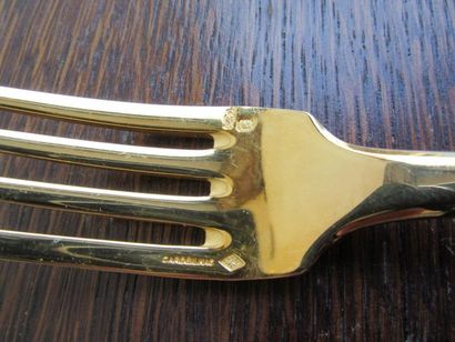 Ménagère (61 pièces) en argent doré. Modèle...