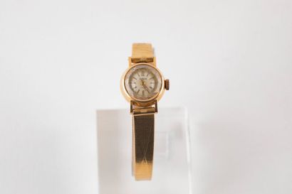 POTENS - Vers 1965
Montre bracelet en or...