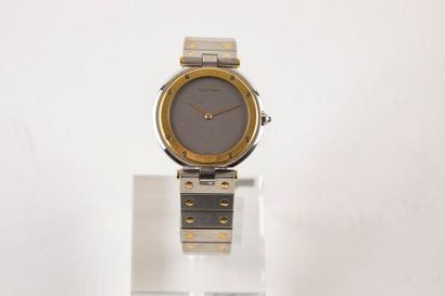 CARTIER
Santos vers 1983
Montre ronde en...
