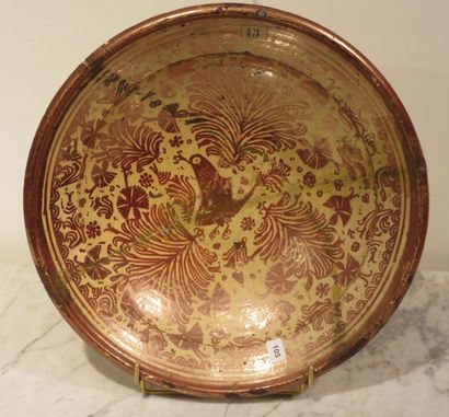 ESPAGNE, MANISES
Plat rond creux à décor...
