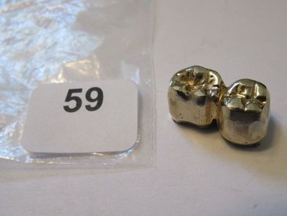 9,20 g or (débris dentaire, or pâle)