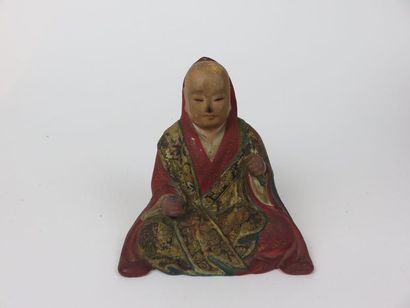 JAPON Statuette de moine en bois laqué rouge...