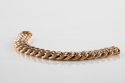 Bracelet gourmette maille américaine en or...