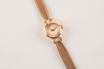 Montre tour de bras de dame en or 750 millièmes,...