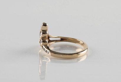 Bague en or jaune ornée d’un pavage de diamant...