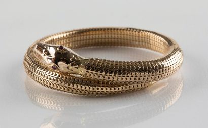 Bracelet or jaune représentant un serpent,...