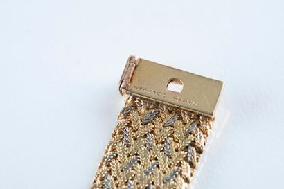 HERMES Bracelet manchette en or jaune et...