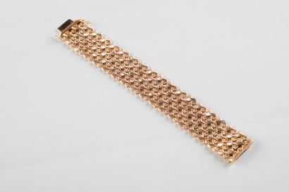 Bracelet articulé en or jaune, maillons alternés...