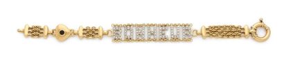 Bracelet 

en or 18K (750), orné d'un cœur...