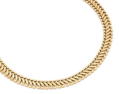 Collier ruban 

en or 18K (750), articulé...