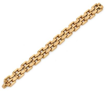Bracelet 

en or 18K (750), articulé de petits...