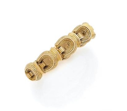 Bracelet 

en or 18K (750) cordé et godronné,...