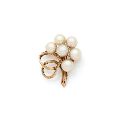 Broche bouquet stylisé 

en or 14K (585),...