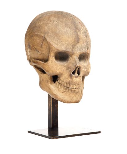 Memento Mori 

Carved wood skull with grey...