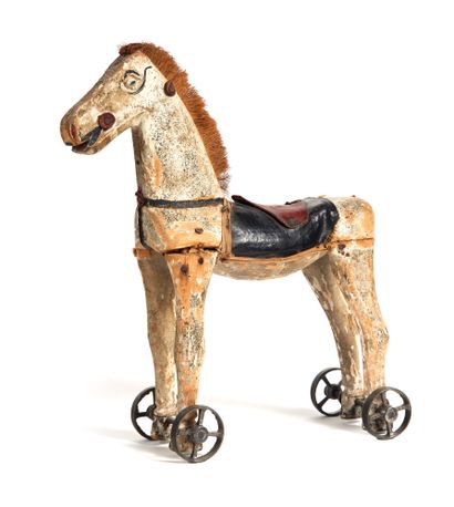 Jouet pour enfant

en bois polychrome, cuir...